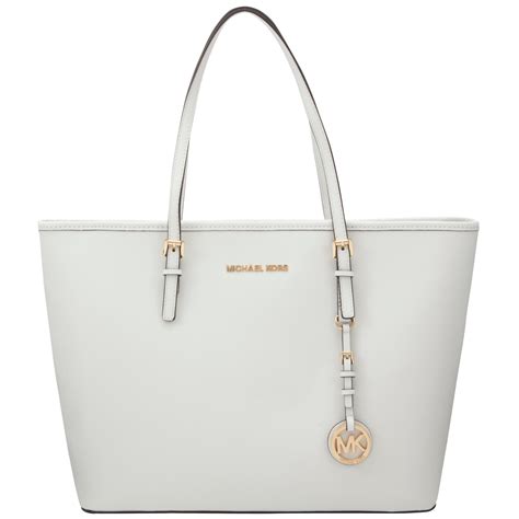 optic white michael kors book bag|Michael Kors white backpack purse.